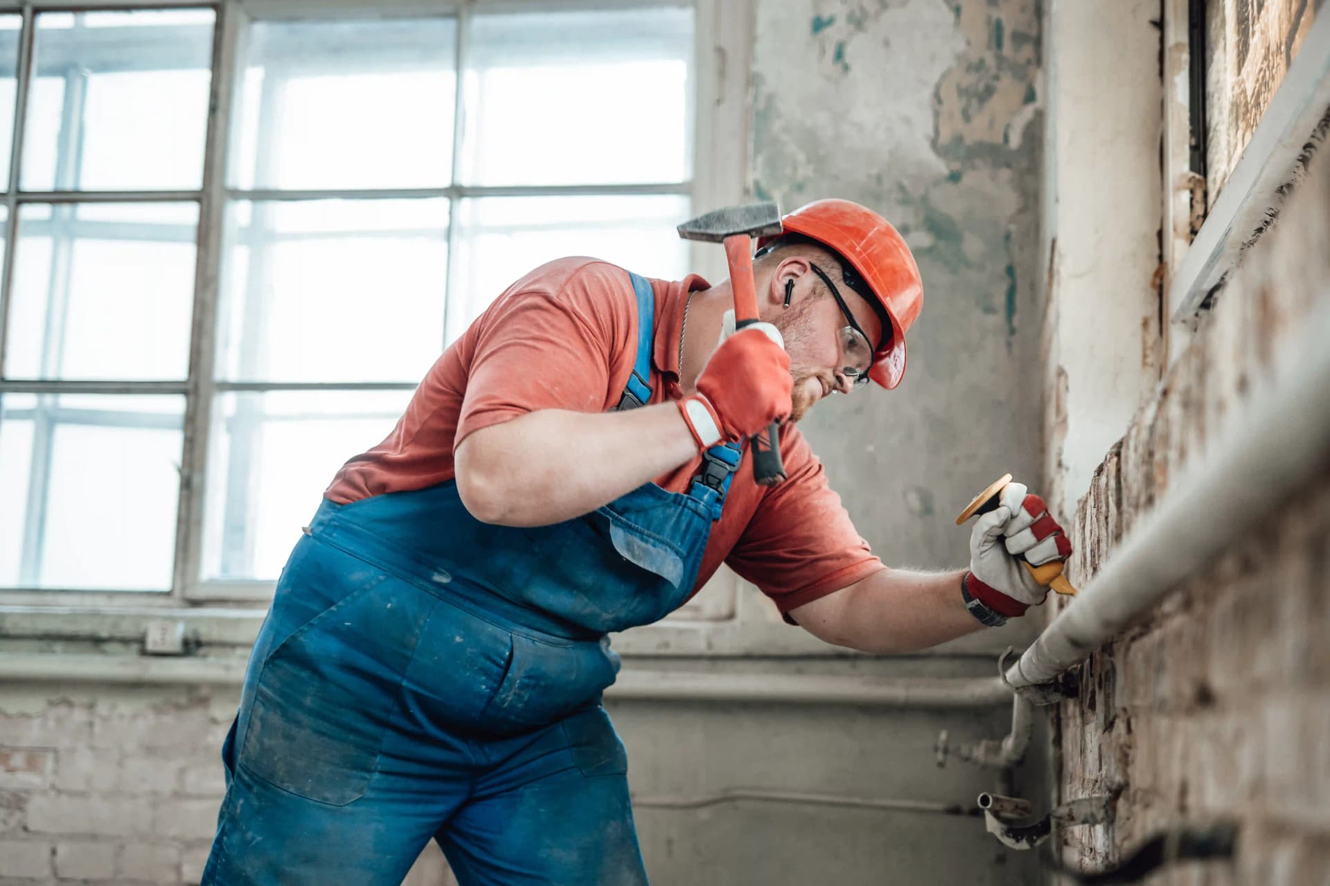 builder-on-a-construction-site-working-as-plumber,webp